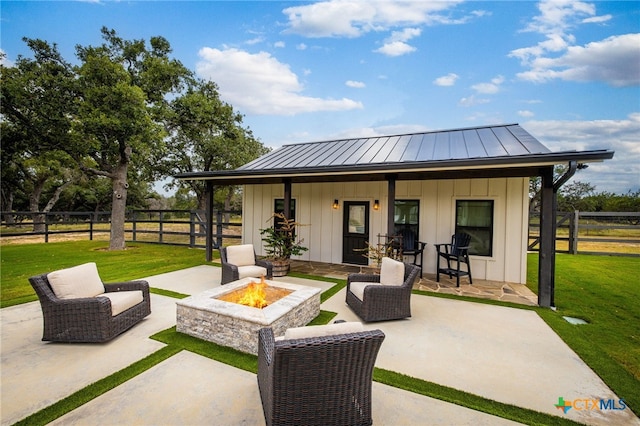 view of patio featuring an outdoor fire pit