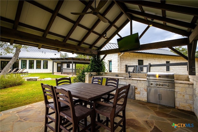 view of patio / terrace with sink, exterior kitchen, a grill, ceiling fan, and a gazebo