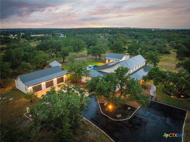 view of aerial view at dusk