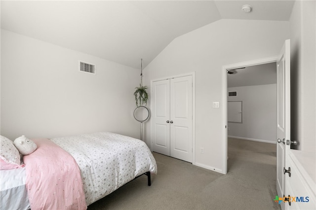 2233 Sauterne Dr, Leander, TX 78641 - bedroom with lofted ceiling, light colored carpet, a closet, and baseboards