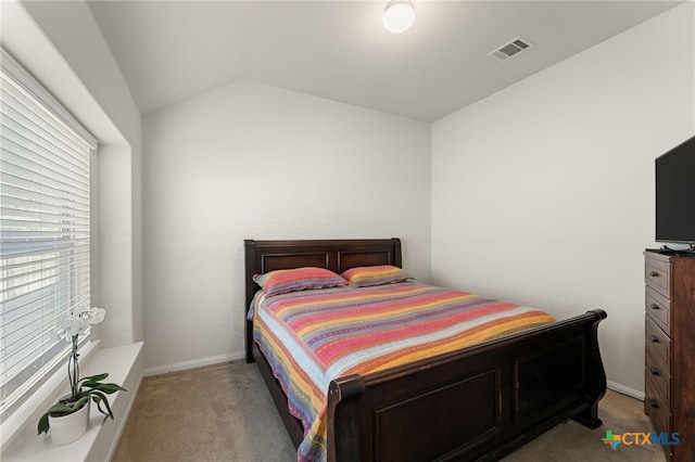 2233 Sauterne Dr, Leander, TX 78641 - bedroom featuring carpet flooring, vaulted ceiling, and baseboards