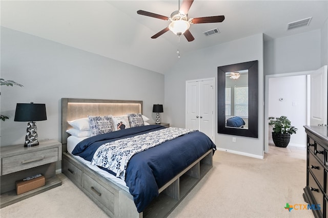 2233 Sauterne Dr, Leander, TX 78641 - bedroom featuring light colored carpet, lofted ceiling, baseboards, a closet, and ceiling fan