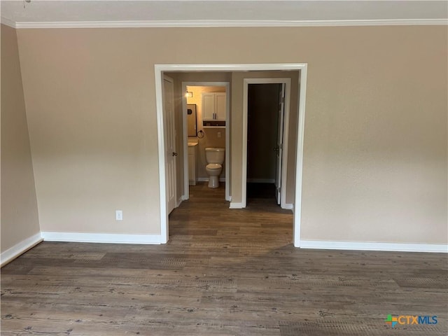 1315 S 51st St, Temple, TX 76504 - spare room with baseboards, ornamental molding, and wood finished floors