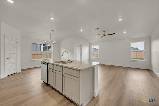 kitchen featuring light hardwood / wood-style flooring, plenty of natural light, and sink