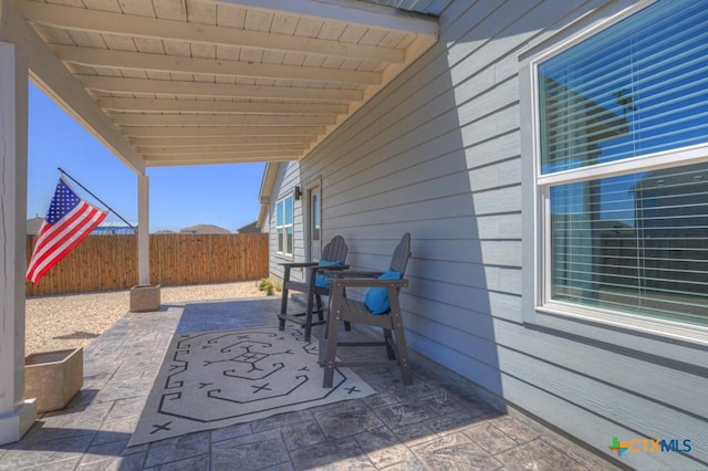 view of patio with fence