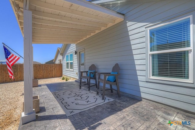 view of patio with fence