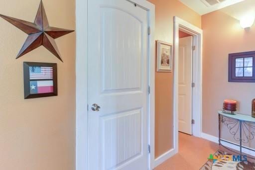 162 Canyon Crk, Canyon Lake, TX 78133 - corridor with baseboards and carpet