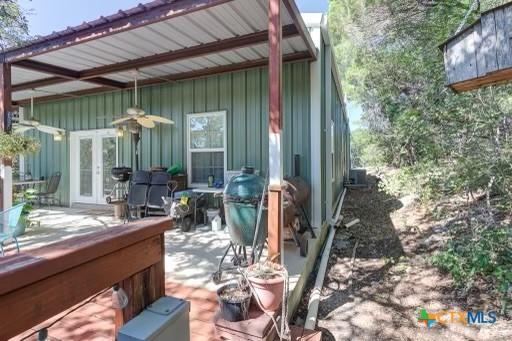 162 Canyon Crk, Canyon Lake, TX 78133 - view of patio with a grill, french doors, and a ceiling fan