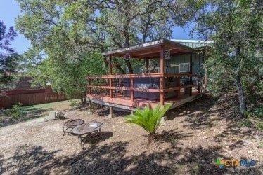 162 Canyon Crk, Canyon Lake, TX 78133 - view of yard with a deck