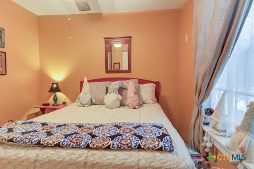 162 Canyon Crk, Canyon Lake, TX 78133 - bedroom with a ceiling fan
