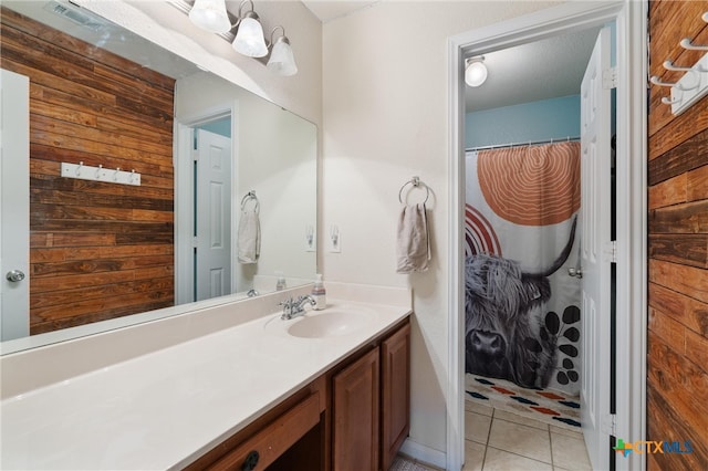 bathroom featuring vanity and tile patterned flooring