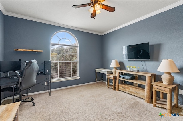 home office featuring ceiling fan, light carpet, and ornamental molding