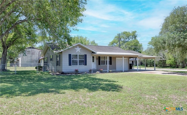207 River St, Hallettsville, TX 77964 - ranch-style home featuring a carport and driveway
