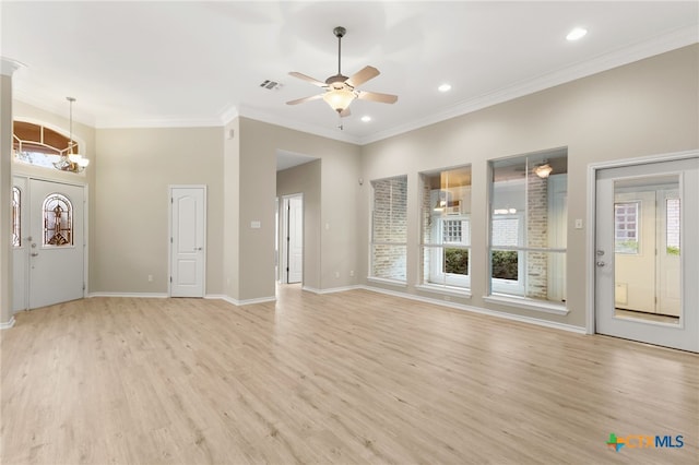 unfurnished living room with baseboards, plenty of natural light, a ceiling fan, and light wood-style flooring