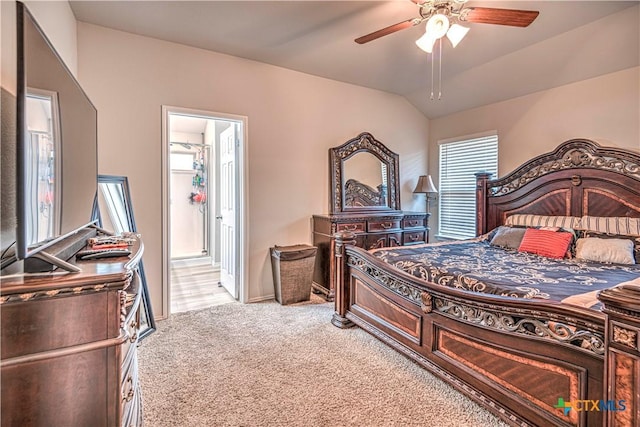3154 Wigeon Way, Copperas Cove, TX 76522 - bedroom featuring light carpet, vaulted ceiling, baseboards, ensuite bathroom, and ceiling fan