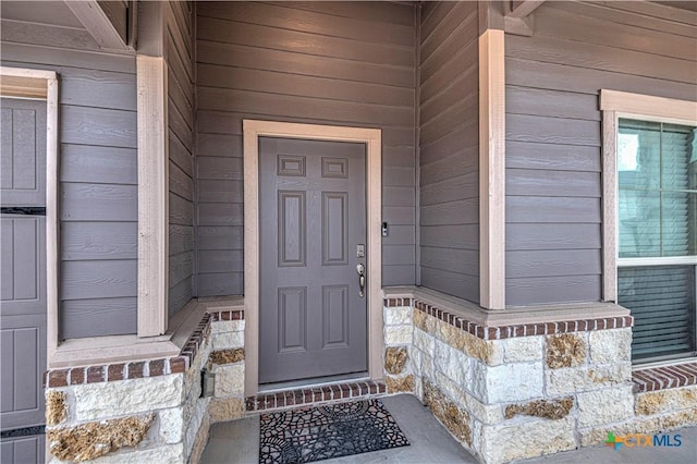 3154 Wigeon Way, Copperas Cove, TX 76522 - doorway to property with stone siding
