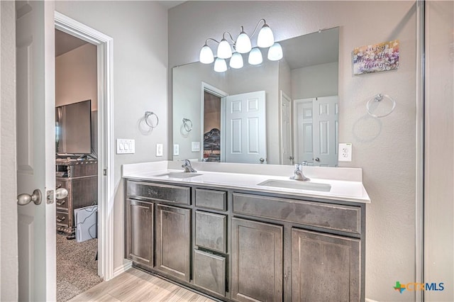 3154 Wigeon Way, Copperas Cove, TX 76522 - bathroom with double vanity and wood finished floors