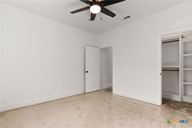 unfurnished bedroom featuring a closet, visible vents, ceiling fan, and baseboards