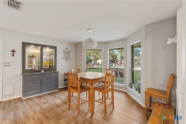1843 Burr Oak Ln, Adkins, TX 78101 - dining area featuring light wood-style flooring and baseboards