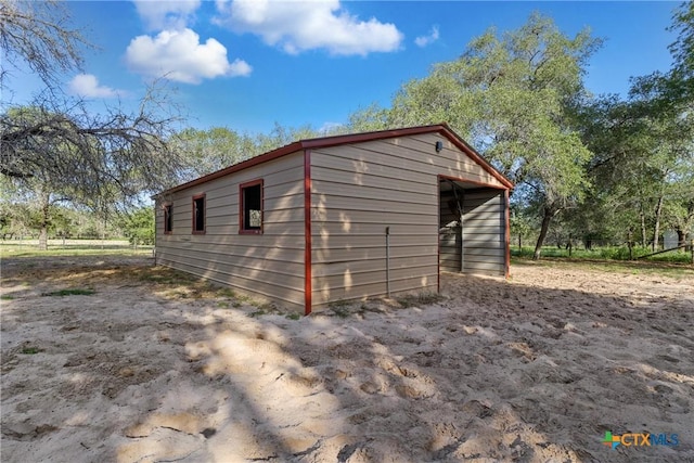 1843 Burr Oak Ln, Adkins, TX 78101 - view of outbuilding with a detached carport