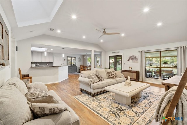 1843 Burr Oak Ln, Adkins, TX 78101 - living area featuring vaulted ceiling, recessed lighting, light wood-type flooring, and ceiling fan