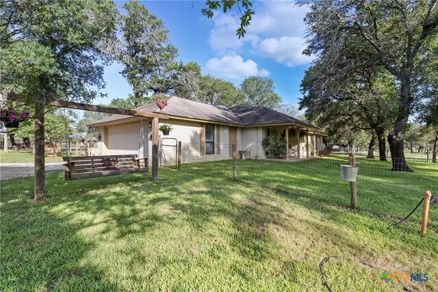 1843 Burr Oak Ln, Adkins, TX 78101 - view of front facade with a garage and a front lawn
