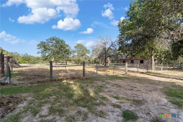 1843 Burr Oak Ln, Adkins, TX 78101 - view of yard featuring a view of countryside and an outdoor structure