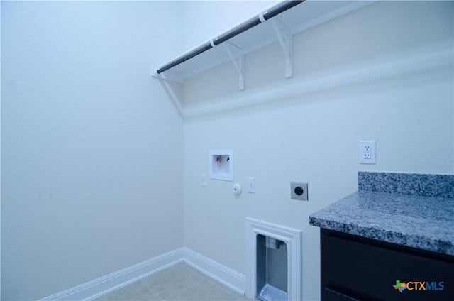 laundry area featuring baseboards, washer hookup, laundry area, hookup for a gas dryer, and hookup for an electric dryer