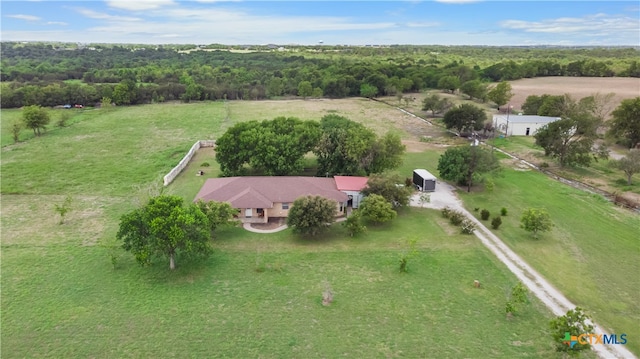 birds eye view of property featuring a rural view