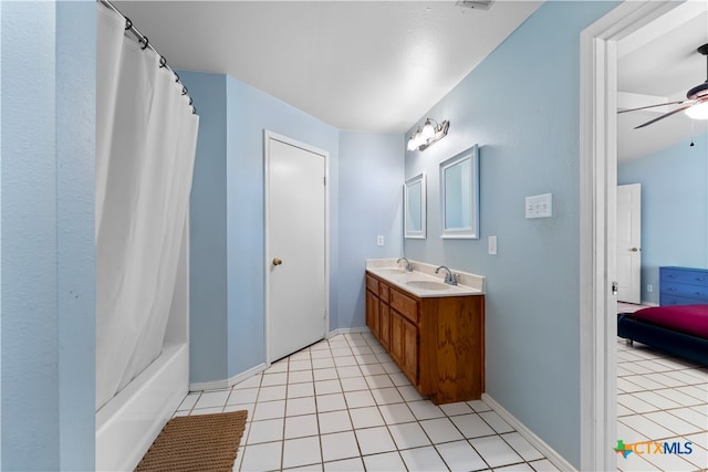 bathroom with shower / bath combination with curtain, vanity, ceiling fan, and tile patterned floors