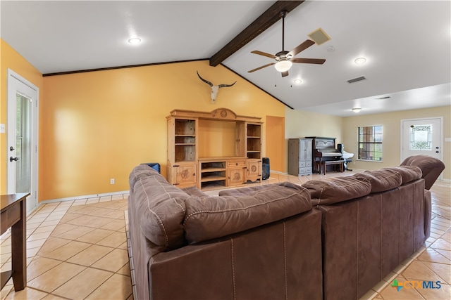 living room with vaulted ceiling with beams, ceiling fan, and light tile patterned flooring