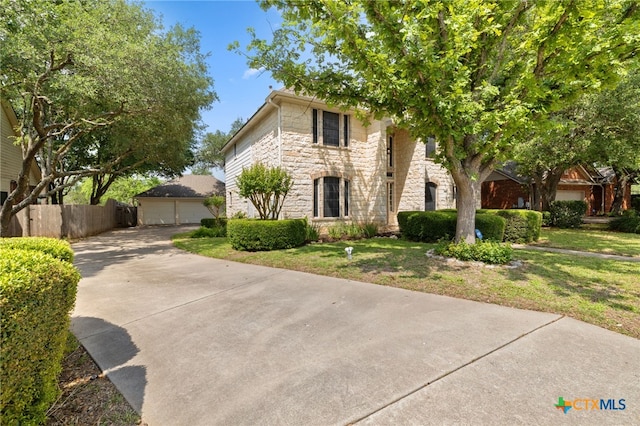 6804 Robert Dixon Dr, Austin, TX 78749 - view of front of property featuring stone siding and a garage