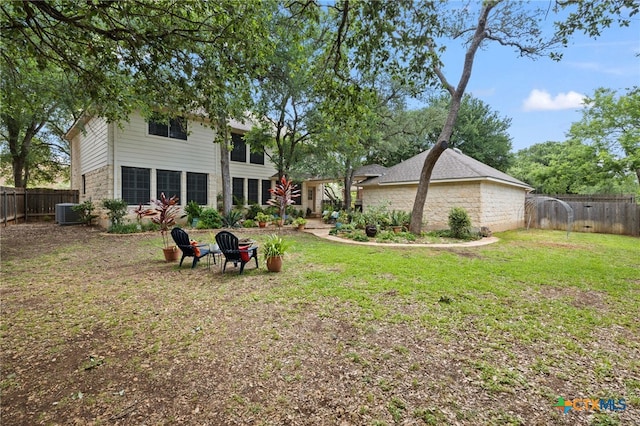 6804 Robert Dixon Dr, Austin, TX 78749 - back of house featuring stone siding and central AC unit