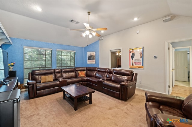 6804 Robert Dixon Dr, Austin, TX 78749 - living area featuring vaulted ceiling, ceiling fan, light carpet, and baseboards