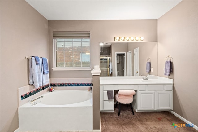 6804 Robert Dixon Dr, Austin, TX 78749 - bathroom with a garden tub, a shower with shower door, and vanity