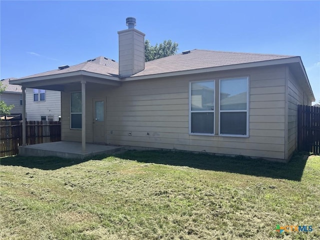 9210 Devonshire Ct, Killeen, TX 76542 - rear view of house featuring a patio area and a chimney