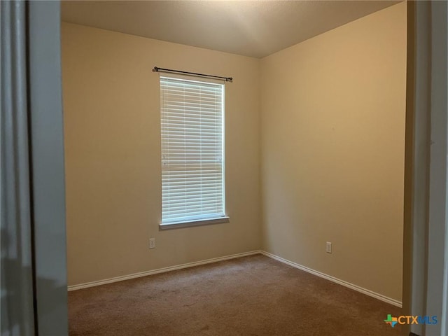 9210 Devonshire Ct, Killeen, TX 76542 - spare room featuring carpet and baseboards