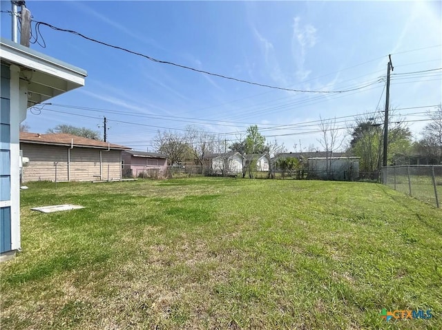 view of yard with fence