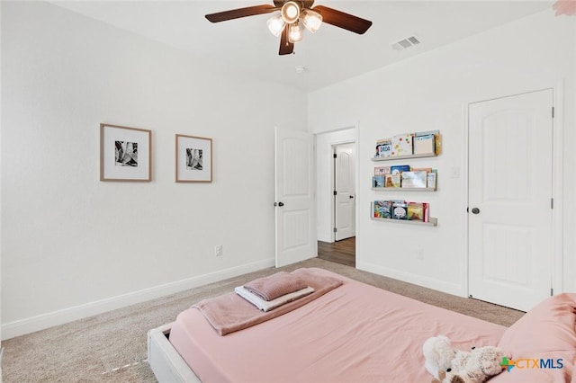 carpeted bedroom featuring ceiling fan