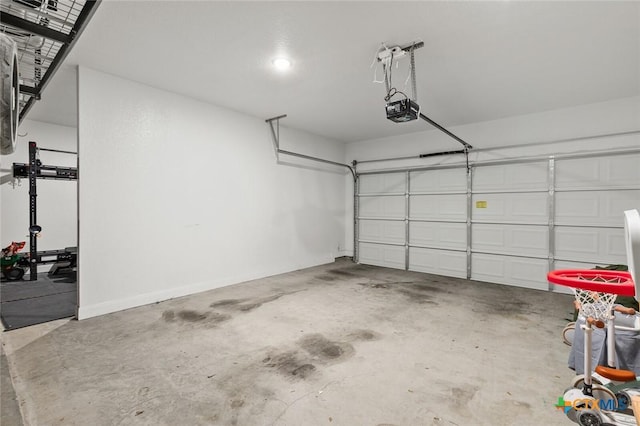 garage featuring a garage door opener