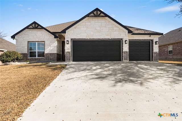 view of front of property with a garage