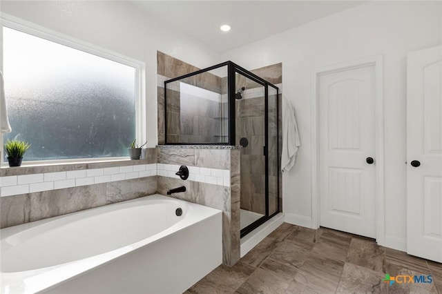 bathroom with independent shower and bath