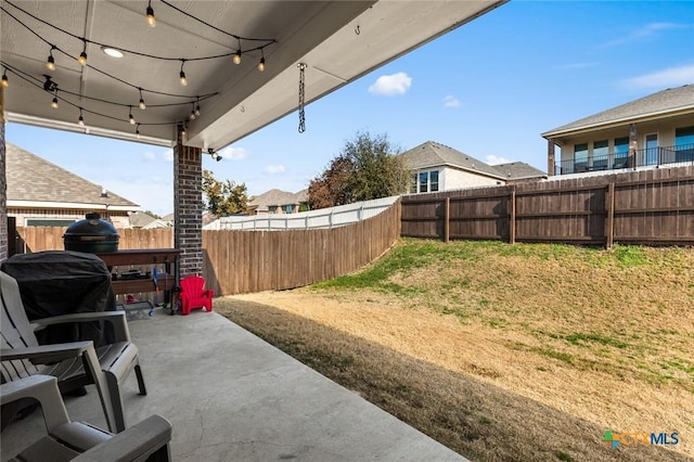 view of yard with a patio area