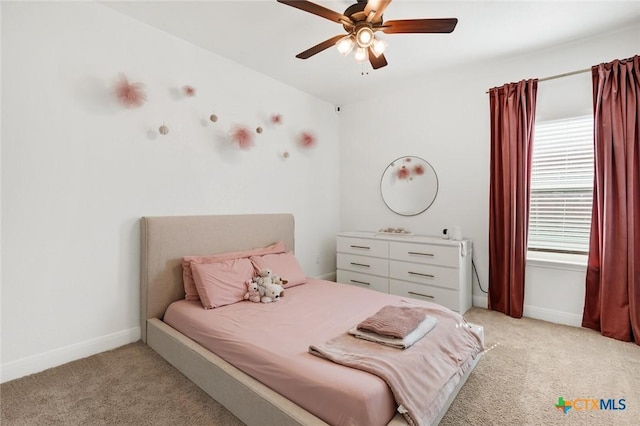 bedroom featuring light colored carpet and ceiling fan