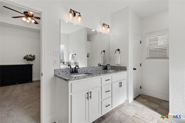 bathroom with vanity and ceiling fan