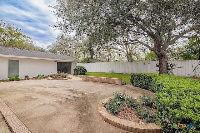 view of patio with fence