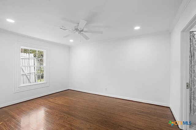 unfurnished room with dark wood-style floors, baseboards, recessed lighting, ceiling fan, and crown molding