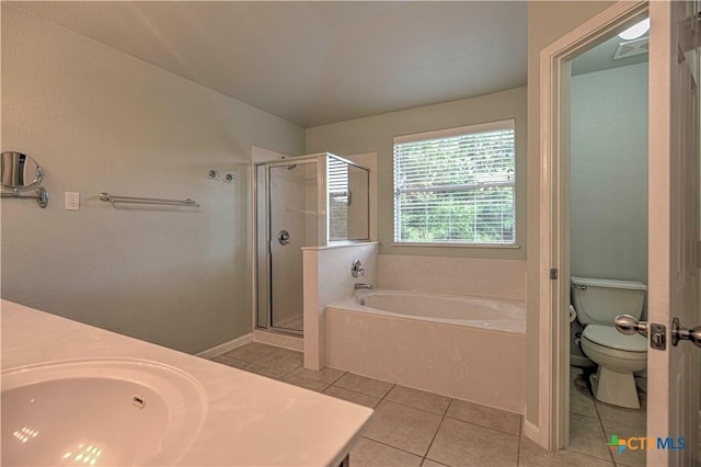 117 Lone Shadow Dr, Harker Heights, TX 76548 - bathroom featuring a bath, tile patterned flooring, a stall shower, toilet, and vanity