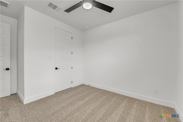 unfurnished bedroom featuring carpet flooring and ceiling fan