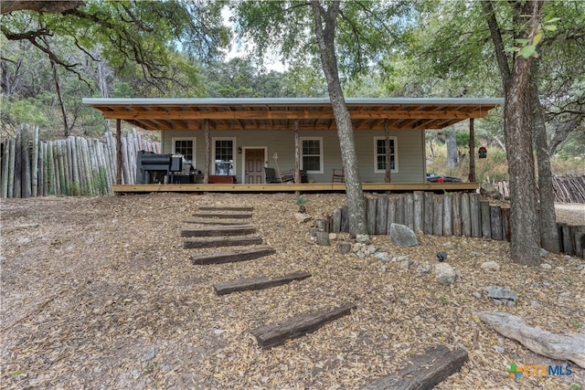 view of front of house featuring a deck